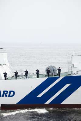 A JMSDF escort ship taking part in a JCG Viewing of the Fleet