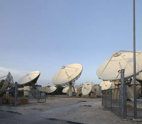 Satellites outside the Al Jazeera studios beam the channel across the world
