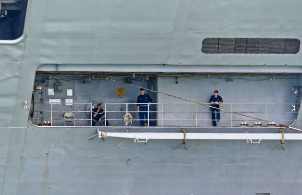 Even in Hong Kong's friendly waters, the crew of the 'GW' must keep watch