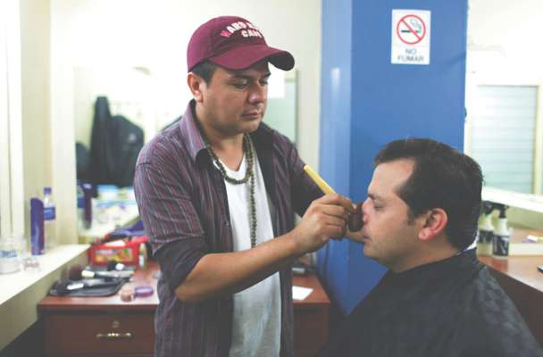 Makeup artist Eduardo Quintanilla gets Dada ready for a TV appearance on Channel 33