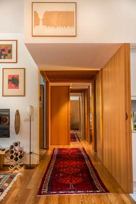 Italian larch wood corridor leading to Piga's study, wardrobes and bedroom