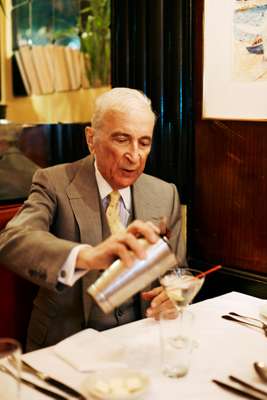 Gay Talese tops up his martini 