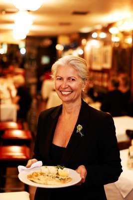 Owner Catherine Treboux delivers the main course