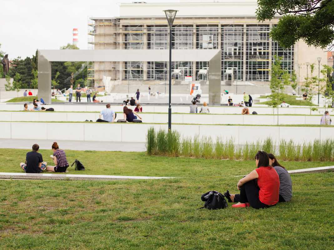 Office workers relaxing in one  of Brno’s new  public spaces 