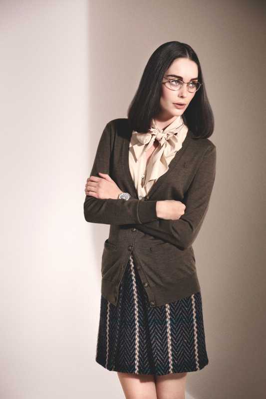 Glasses by Oliver Peoples, cardigan by Ralph Lauren, shirt by Beymen, skirt by Bally, watch by Patek Philippe