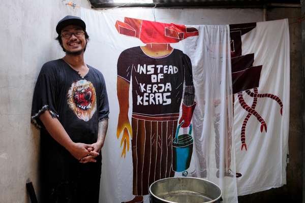 Artist Eko Nugroho’s colleague and batik-craftsman Arwin Hidayat