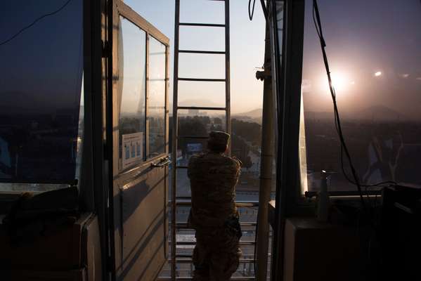 US military public  affairs officer looking out over Kabul