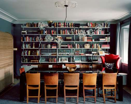 The library is filled with Mix’s collection of books and objects. It’s a flexible space designed for meetings and meals