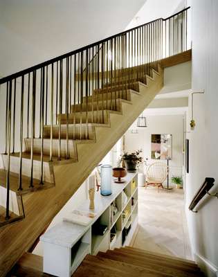 The main staircase has been remodelled, creating nooks bathed in natural light for afternoon reading 