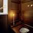 The smallest rooms are entirely wood-panelled with old-fashioned water closets, marble basins and brass fixtures 