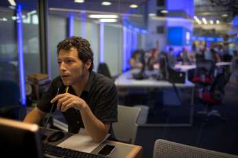 Journalist on the newsdesk