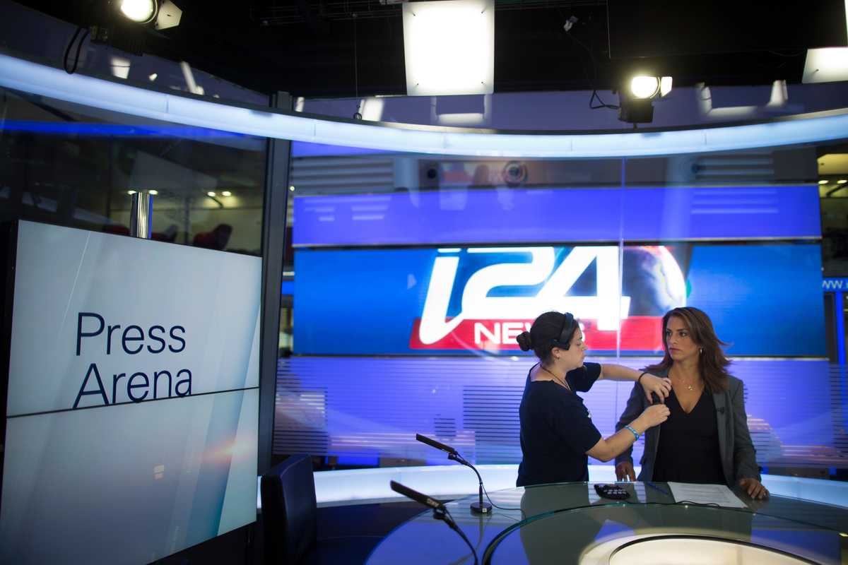 News anchor Hadas Sinai gets ready to broadcast 