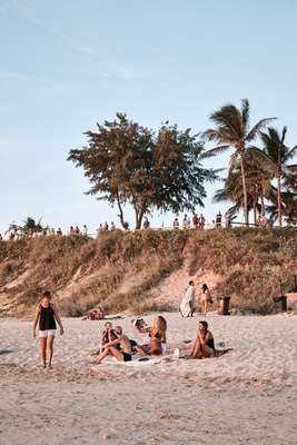 Tourists enjoy the sunset at Cable Beach