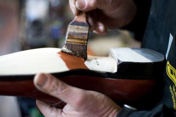 Bruno Falappa paints a leather sole