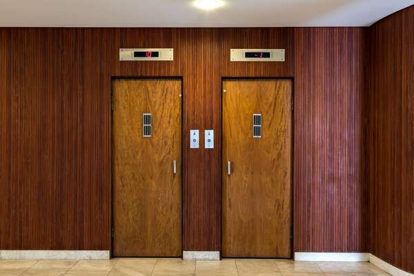 Restored wooden lifts sit side by side