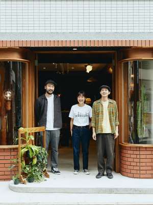 Matsushima (on right) and staff 