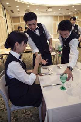 Learning how to serve a glass of wine