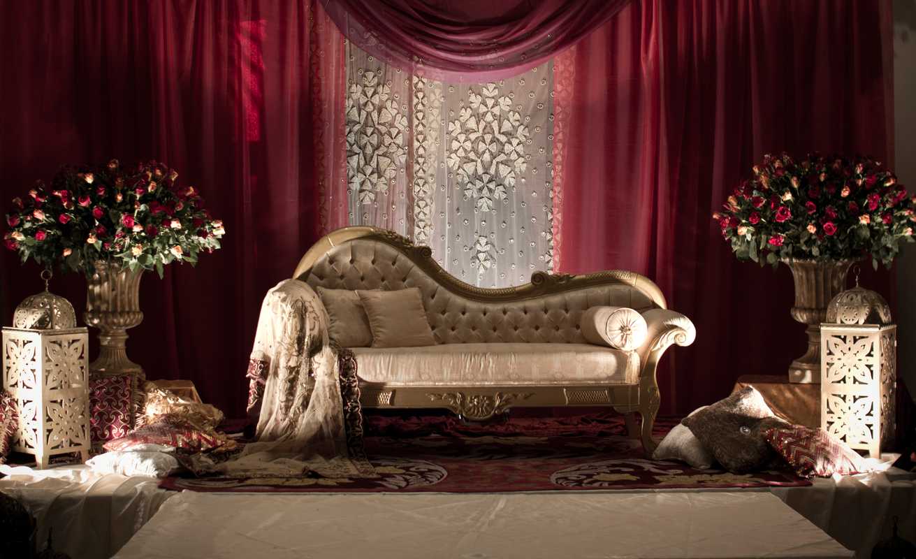 Opulently adorned sofa in one of the Corinthia Hotel’s wedding halls 