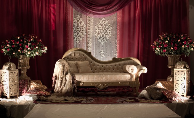 Opulently adorned sofa in one of the Corinthia Hotel’s wedding halls 