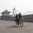 Tourists and locals ride bikes around Xi’an’s ancient city wall