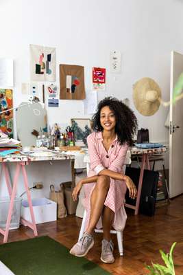 Lane Marinho at her drawing board