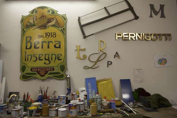 Berra's old shop sign in workshop