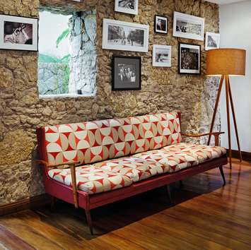 Sofa: Vintage Brazilian. Roman and Andrea source much of their furniture from the local antique markets