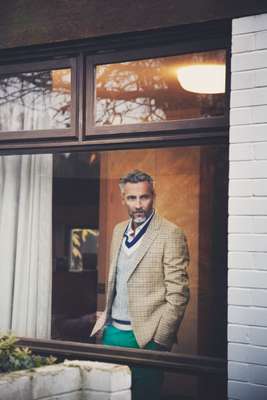 Jacket by Prada, waistcoat by Hackett, shirt by Dunhill, trousers by Incotex