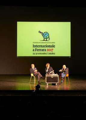 Romano Prodi (left) and fellow speakers at the Teatro Nuovo