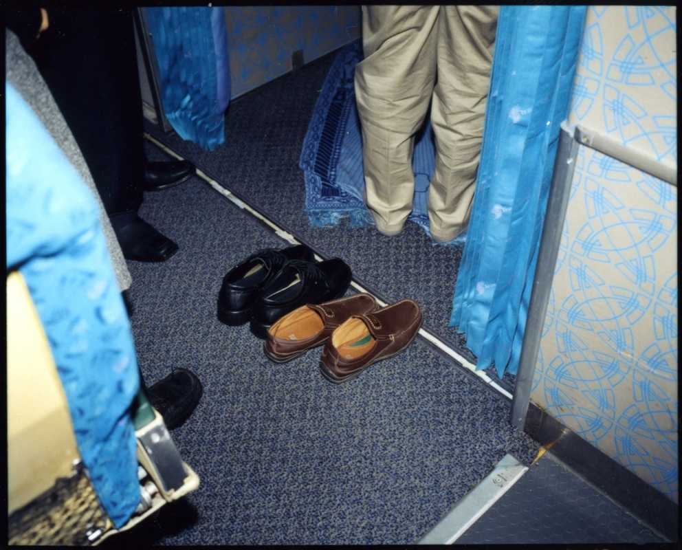 Shoes belonging to passengers outside Flight 744’s on-board prayer room 