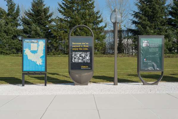 Poster boards displayed at the outdoor showroom