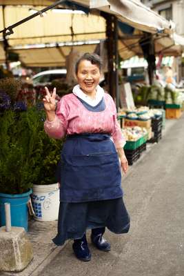 Fish seller at the morning market in front of Kagoshima Central station