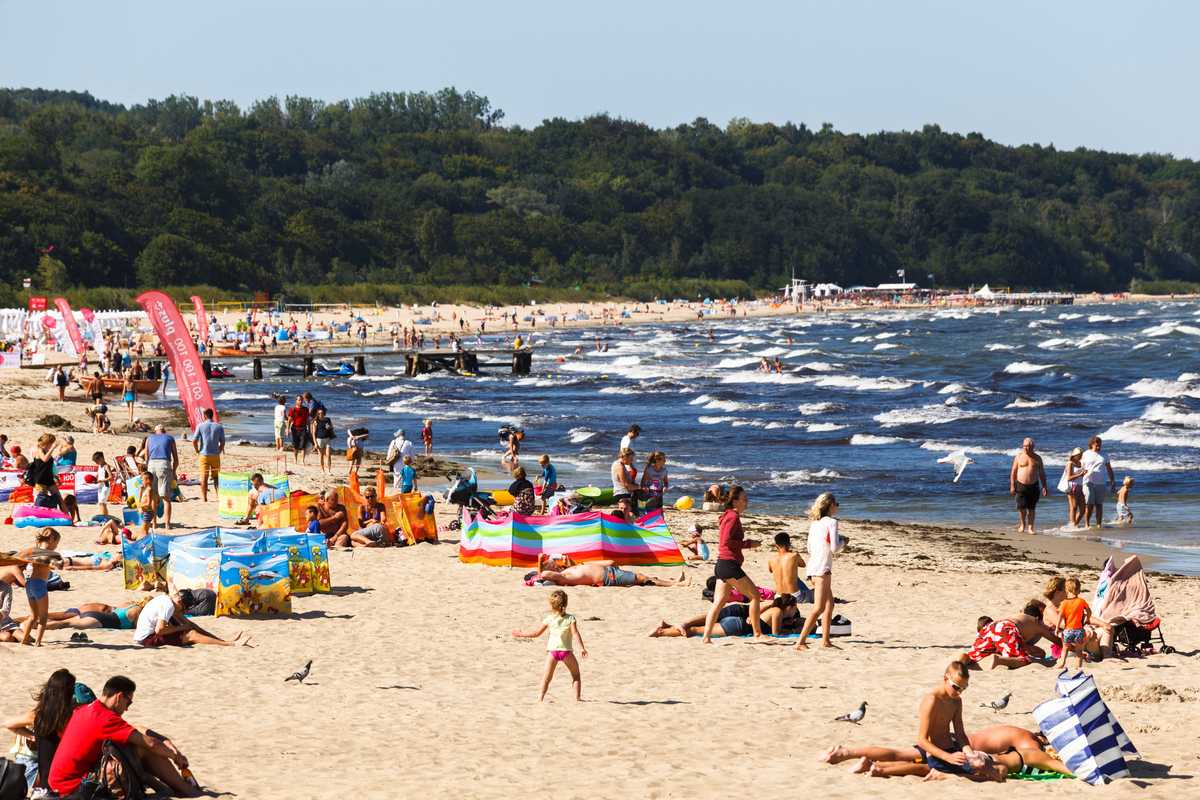 City-dwellers relax on the beach in Sopot