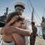 Sailor Diogo Amorim says goodbye to his girlfriend Danielle as the ‘Sagres’ prepares for its three-month deployment to Brazil 