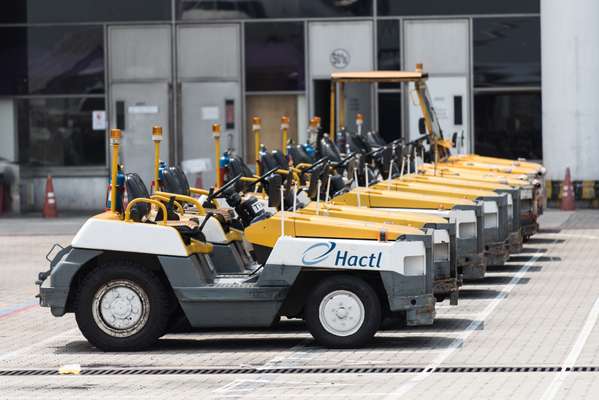 Tow tractors parking at the apron