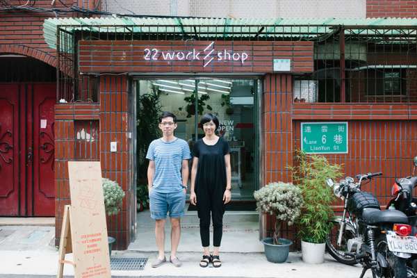 22 Design Studio owner Sean Yu with staff member