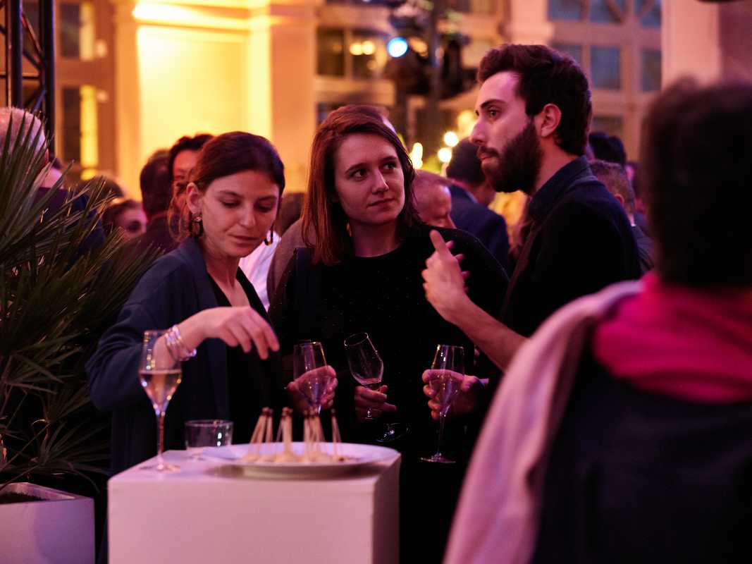 Guests enjoying a digestif after a Live Magazine show in Le Trianon 