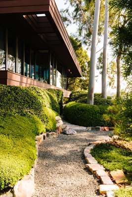 Japanese-inspired gardens surround the house 