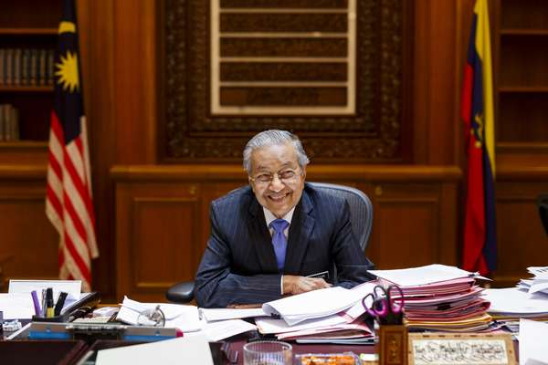 The PM at the same desk he used 15 years ago