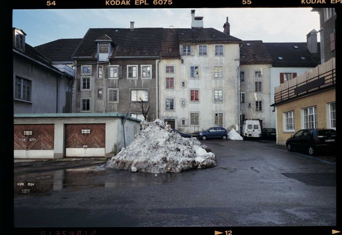Rue Daniel-Jean Ricard with a pile of thawing snow