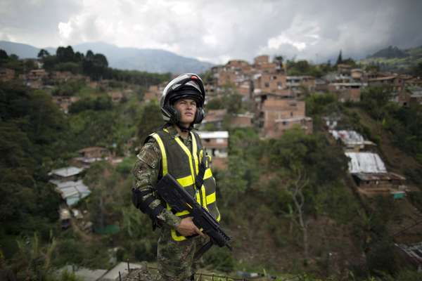 Soldier on slum patrol