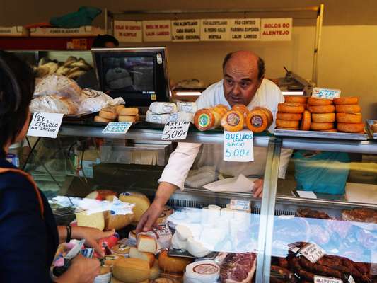 Cheese seller at town market