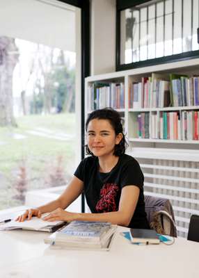 Student in the Maison Mexique library