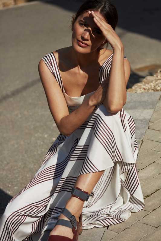 Dress by Loro Piana, sandals by Hermès