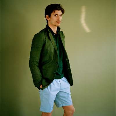 Jacket by Burberry Prorsum, polo shirt by Brooks Brothers, shorts by Incotex, belt by Paul Smith
