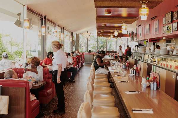 Owner Jim Poulos has been fixing the lighting and banquettes at Pann’s to return them to their 1950s best