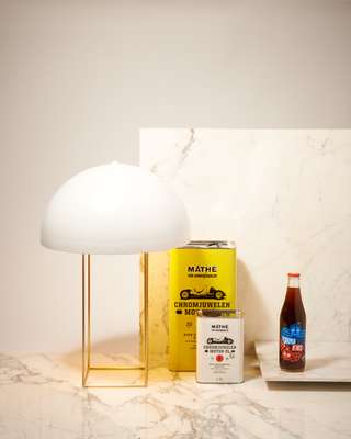 Lamp, motor oil & Karma Cola soda drink