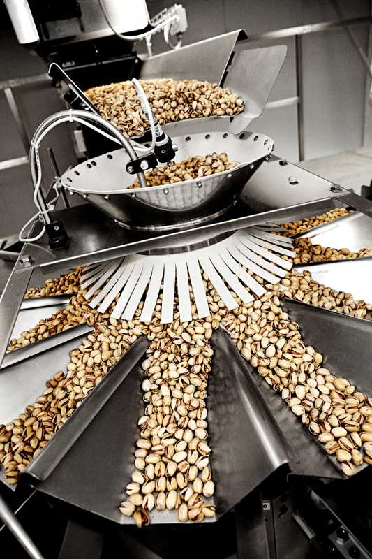 Pistachio nuts are sorted and weighed before packaging