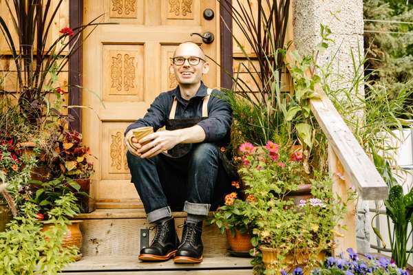 Greg Morgan outside his home and workshop