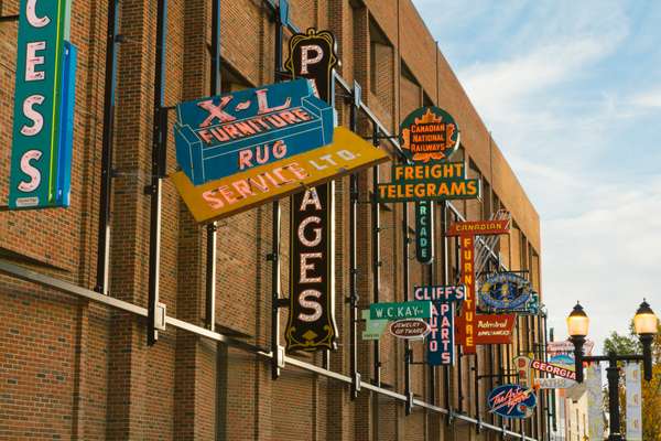 Historic neon signs now sit on a wall downtown 